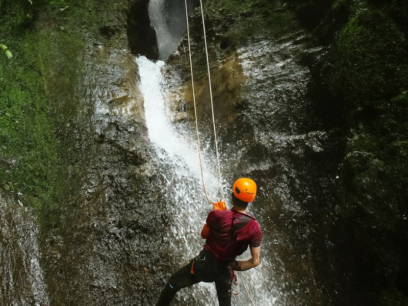 Action shot during Arenal Volcano Waterfall Rappelling